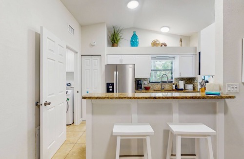 Naples Park House | Beach home with outdoor sundeck, hot tub, enclosed yard & patio