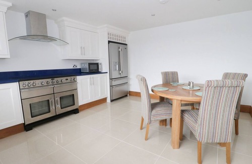Benllech Apartment | BEACH HOUSE APARTMENT, luxury holiday cottage, with pool in Benllech