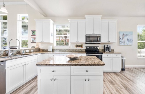 Cocoa Beach House | Beach House on 8th Street South with heated hot tub and pool.