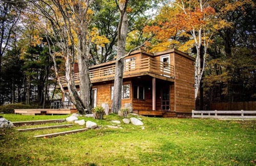 Onekama House | Beaches & View on Lake Michigan and Portage Lake. Secluded home & private dock