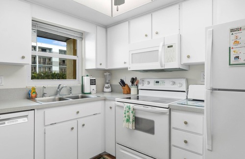 Avon By The Sea Condo | Beachfront 2BR Condo W/Pool BBQ & Steps To Beach Close to Space Center and Dini