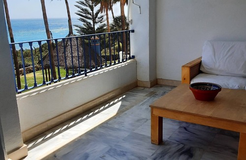 Velilla-Taramay Apartment | Beachfront apartment, swimming pool with salt water, gardens 2 min walk to the beach.