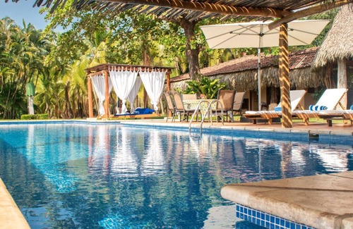 Islita House | Beachfront Bliss! Private Beach and Spa Access. Daily Maid Service.