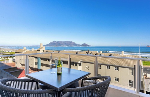 Flora Park Apartment | Beachfront Bliss with Pool & Ocean Views