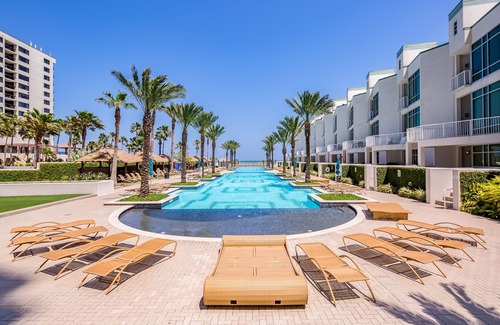 South Padre Island Condo | Beachfront Complex with Private Hot Tub, Shared Pool, Fitness Room, & Game Room