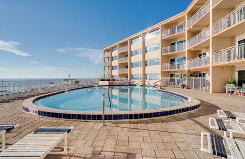 Satellite Beach Condo | Beachfront Comfort: Ground-Floor Unit with Stunning Views, Heated Pool & BBQ Grill!