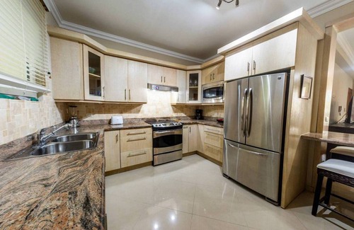 Playa Chiquita Apartment | Beachfront condo in downtown Sosua, guest-friendly, sea views