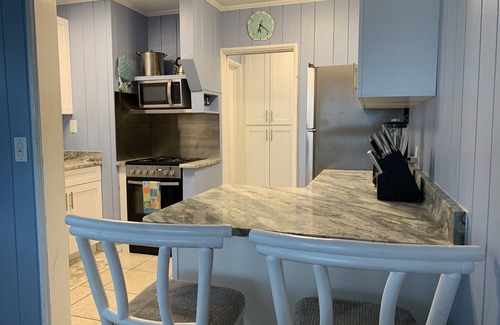 Indian Shores Cottage | BEACHFRONT COTTAGE! Step out the door and into the sand! On the Gulf of Mexico!