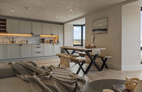 Mumbles Apartment | Beachfront eco-friendly apartment with ocean view and modern interior sleeping up to 6