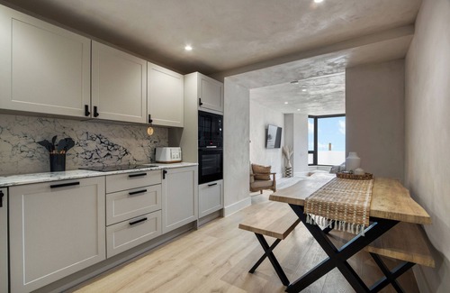 Mumbles Apartment | Beachfront eco-friendly apartment with ocean view and modern interior sleeping up to 6