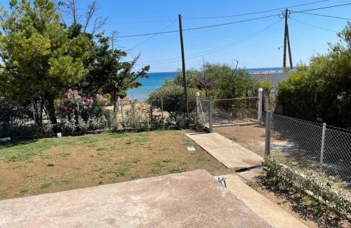 Katakolo House | Beachfront Family Home