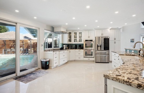 Pompano Beach Villa | Beachfront Oasis w/Htd Pool Cinema Game-Room Tiki