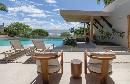 Playa Langosta Villa | Beachfront staffed Villa w/breakfast, jacuzzi, pizza oven, golf cart included