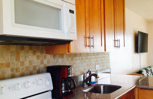 Makaha Condo | Beachfront Studio located on the 5th floor overlooking Makaha Beach.
