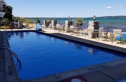 Traverse City Condo | ✵ Beachfront Walkout Condo: Pointes North Resort ➠ 106