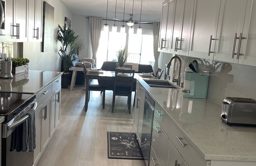 St. Petersburg - Clearwater Condo | Beachside Condo, Furnished, Renovated 2bed/2bath/Balcony kitchen and living room