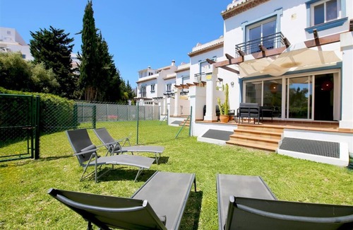 Estepona House | Beachside family townhouse with air con and Wifi, Next to the beach and close to Estepona Port