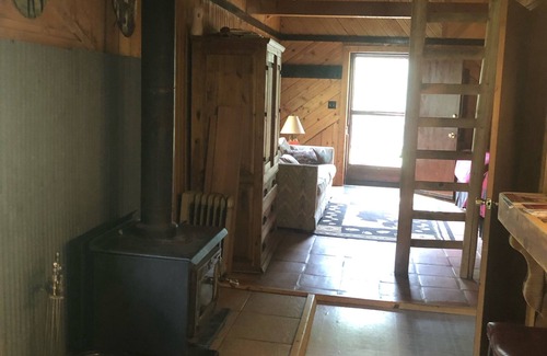 Dolores Cabin | Bear Bait Cabin is cozy and rustic overlooking beautiful aspen trees