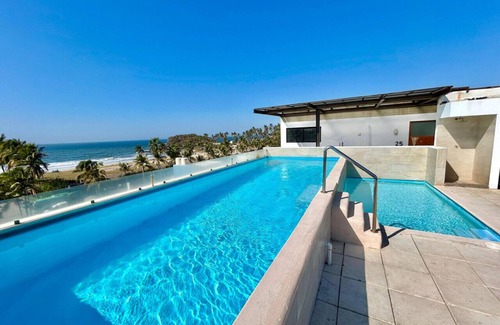 Zona Dorada Condo | Beautiful 100 steps from the beach/roof by Gpsrentas