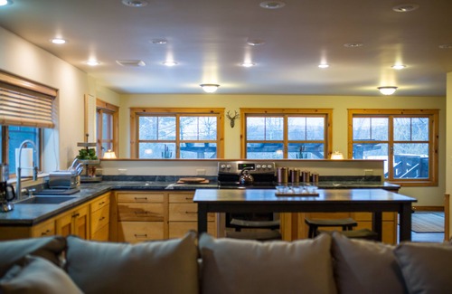 Lake Placid Condo | Beautiful 4-bedroom with private outdoor space. 5min walk to Main St