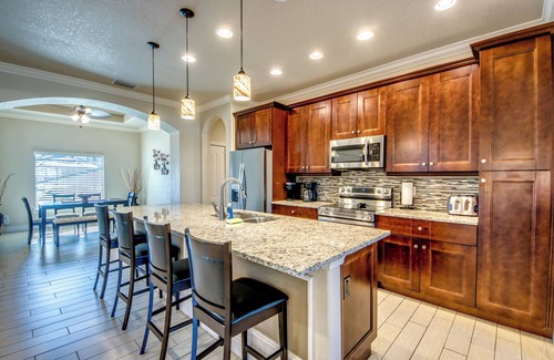 Cape Coral Villa | Beautiful 4 BR waterfront Villa w. heated pool/kayaks/bicycles/fishing poles