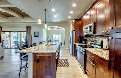 Cape Coral Villa | Beautiful 4 BR waterfront Villa w. heated pool/kayaks/bicycles/fishing poles