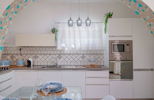 Eden Beach Villa | Beautiful apartment in villa for 5 people with WIFI, A/C, pool, TV and patio