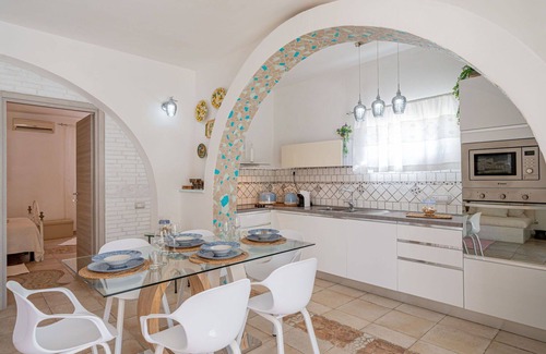 Eden Beach Villa | Beautiful apartment in villa for 5 people with WIFI, A/C, pool, TV and patio