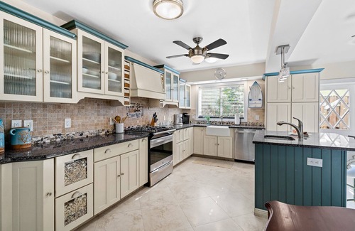Birch Park Finger Streets House | Beautiful Beach House with pool, lush tropical landscaping steps from the ocean