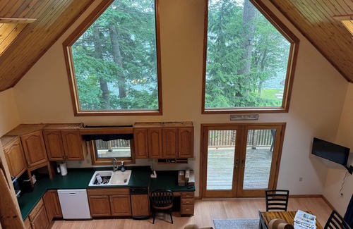 Hancock County Ski Chalet | Beautiful beachfront chalet with southern exposure on Green Lake,Dedham, Maine.