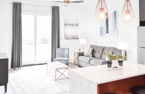 Central Business District Apartment | Beautiful Brand New Loft! BEST Location on Bluff!
