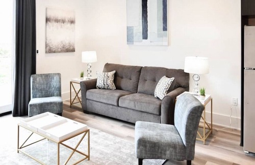 Central Business District Apartment | Beautiful Brand New Loft! BEST Location on Bluff!