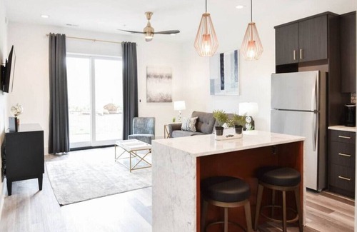 Central Business District Apartment | Beautiful Brand New Loft! BEST Location on Bluff!