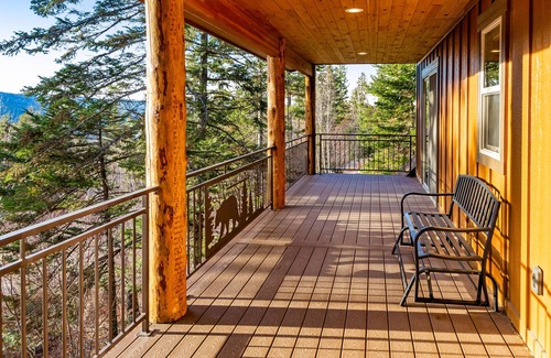 Bigfork House | Beautiful cabin overlooking Swan Lake with 2-level deck, fireplace & firepit