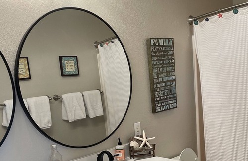Carova Beach Cottage | Beautiful Canal front home in 4x4 area beach parking passes and linens included!
