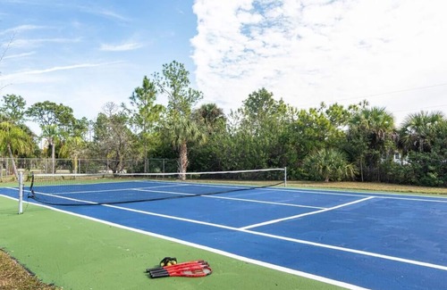 Rural Estates Villa | Beautiful Canal Front Home with Pool, Tennis Court