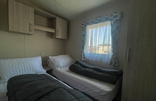 Felixstowe House | Beautiful caravan with free WiFi and decking at Suffolk Sands Park ref 45083C