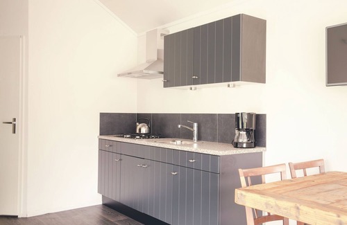 Municipality of Rijssen-Holten Ski Chalet | Beautiful chalet in a holiday park by a pond