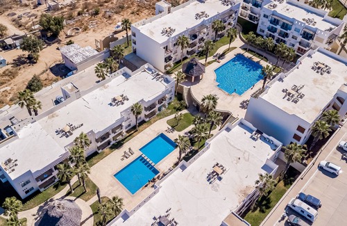 Libertad Apartment | Beautiful condo with a balcony, kitchen, sparkling pools, & fitness center