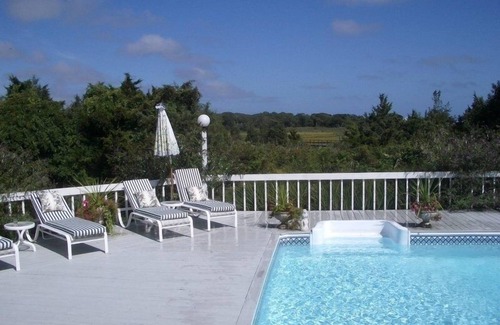 Westhampton House | Beautiful, dog-friendly 4BR home on 1.6 acres. Waterfront view and private dock.