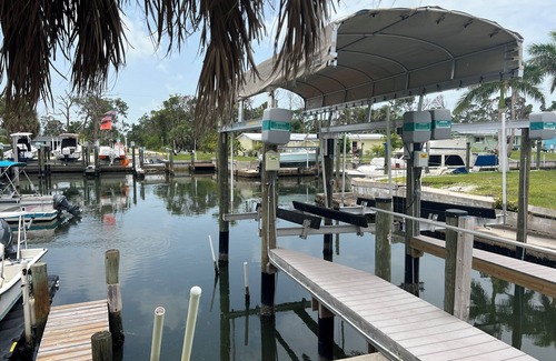 Grove City House | Beautiful Englewood beach home with boatslip