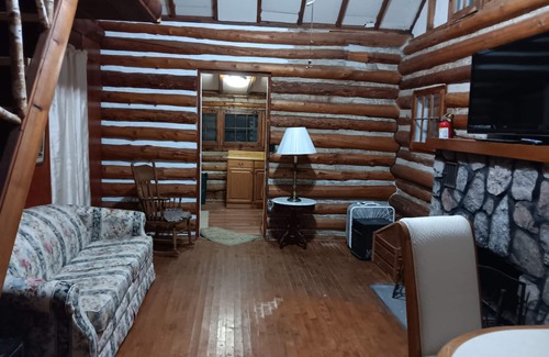 Kalkaska Cottage | Beautiful full log cabin with direct private frontage , beautiful sunsets .