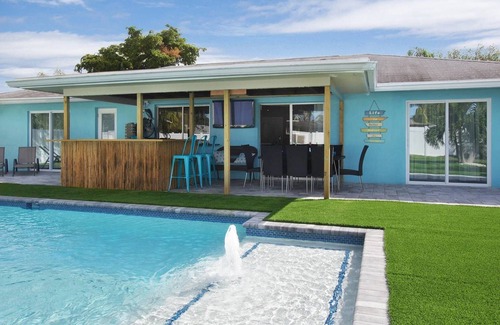 Caloosahatchee House | Beautiful fully renovated home with stunning heated pool, walk to downtown