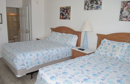Calabash Villa | Beautiful Ground Floor Two Bedroom Condo just steps from the Pool!