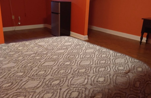 Hutto House | Beautiful home away from the city. Room is cozy and comfortable.