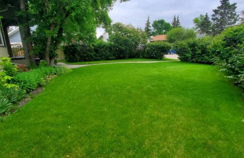 Southwest Calgary House | Beautiful Home in Calgary, Private Garden and Deck