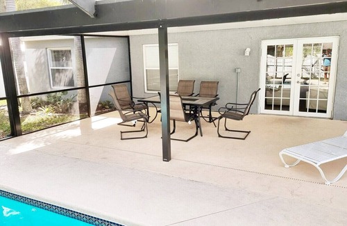 Port Saint Lucie House | Beautiful Home in East Port St Lucie. Heated and Screened Saltwater Pool