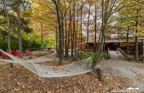 Fayetteville House | Beautiful home- near the University-large outdoor spaces and a hot tub.