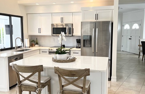 Connors House | Beautiful home on canal w/pool, walking distance to Vanderbilt Beach
