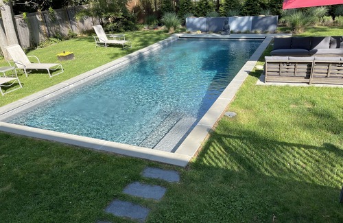Clearwater Beach House | Beautiful home with gunite heated pool, walk to bay beach club!